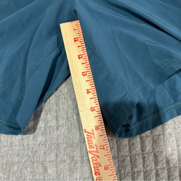 REI boys quick dry shorts in teal. - Picture 7 of 9